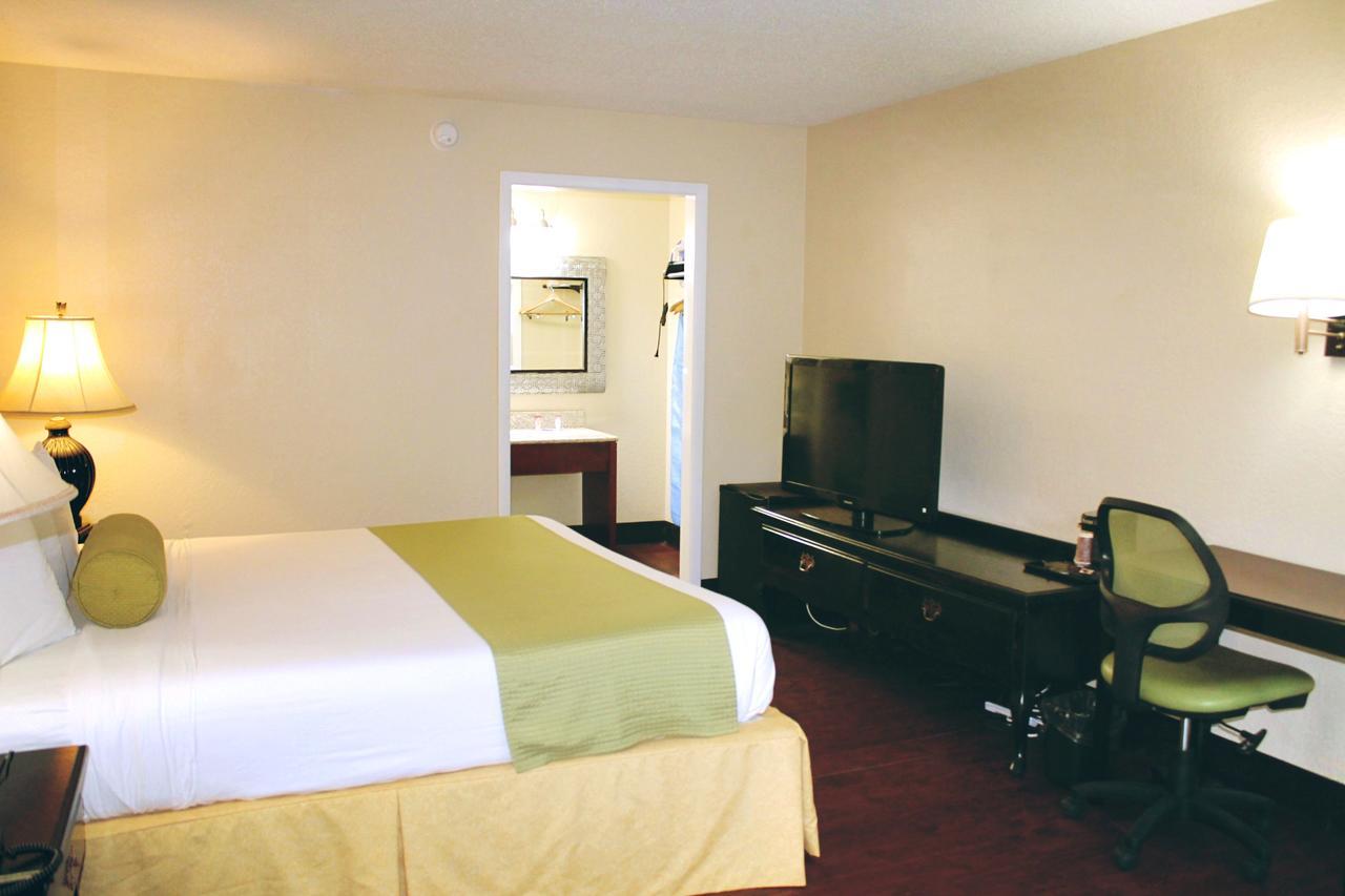 Residence Hub Inn And Suites Marianna Bagian luar foto